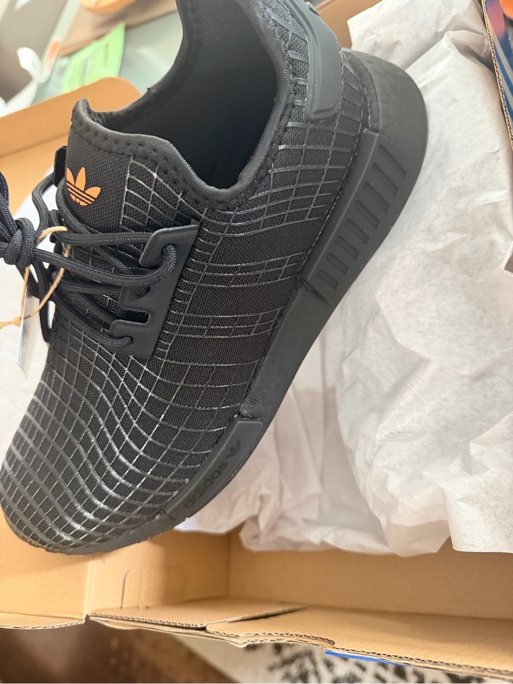 adidas Originals NMD R1 men’s 9.5 Black Athletic Shoes with Orange Logo